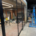 Balloon Street Mesh Partition to Accommodate Sloping Floor